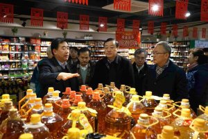 国家粮食局等领导视察超市发万泉庄店